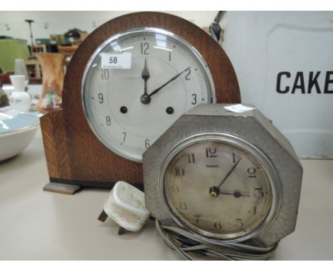 An electric pewter mantle clock by Ferranti and a mid 20th century mantle clock
