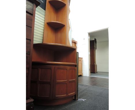 A vintage Nathan teak corner shelf