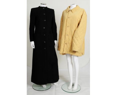 A pale yellow quilted Hermès coat, button fastening to front with buttons stamped 'Hermes Paris', Hermes Paris label and size