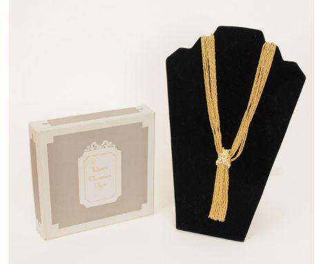 A 1969 Christian Dior gilt metal long multi strand necklace with diamante detail, clasp stamped Dior, Germany, 1969, in origi