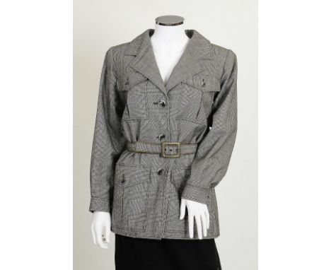 A 1980s grey tweed Yves Saint Laurent jacket, breast pockets, button fastening to front, long sleeves, belt to waist, Yves Sa