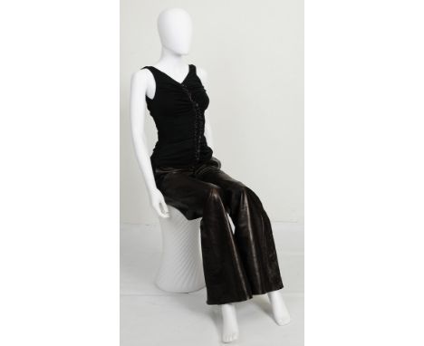 A pair of Alexander McQueen brown leather flared trousers from 2000, button detail to bottom of each leg, zip fastening to fr