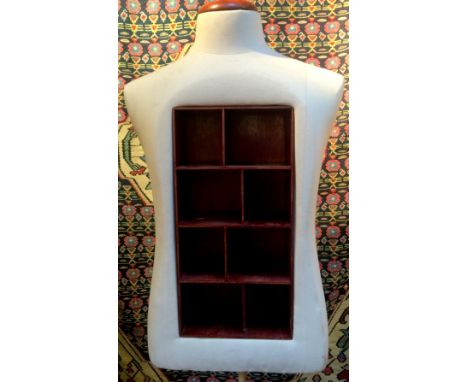 A male torso mannequin with wooden box compartments to chest, wooden stand and base