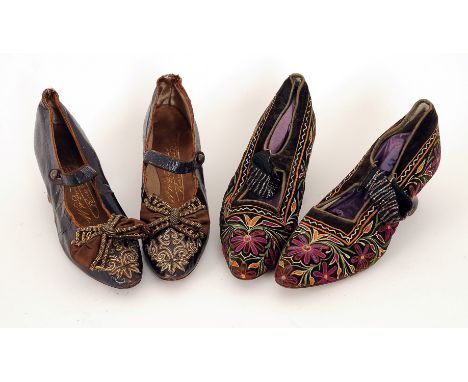 A pair of 1880s dark brown leather shoes with embroidered and beaded detailing with a bow decoration to the front, single but