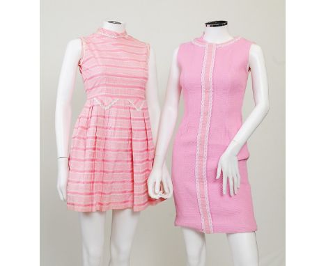 Two pink 1960s mini dresses; one with a pink stripe, lace and gingham design with lace detailing around armholes and on neck,