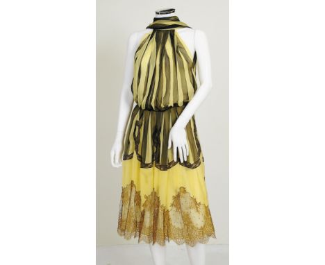 A 2006 Alexander McQueen black and yellow striped silk dress with yellow and copper lace detailing to bottom, halter neck, ti