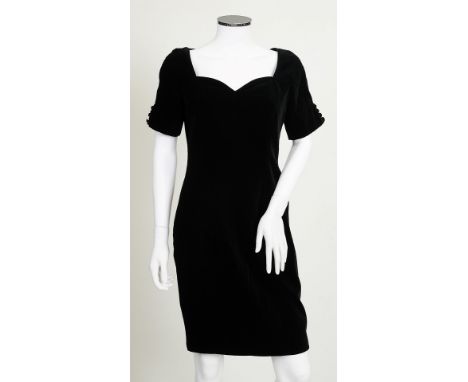 A Christian Dior black velvet dress, sweetheart neckline, button detailing to short sleeves, Christian Dior label to inside, 