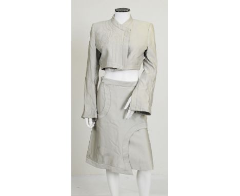 A 2000 Alexander McQueen two piece pale green skirt suit, cropped jacket with long fluted sleeves, silver thread embroidered 