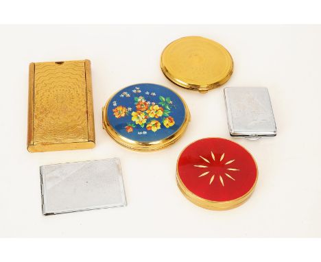 A 1960s Stratton compact with a blue background and floral design; a 1950s Margaret Rose gilt metal compact with red lid; one