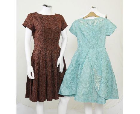 A 1950s turquoise floral lace dress with satin and metallic thread embroidered detailing to neck and skirt, capped sleeves, z