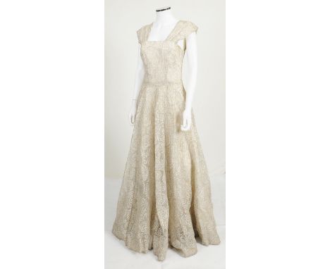 A handmade silvered net and lace wedding dress from 1949, silk underskirt with floral patterned net and lace overlay with sil