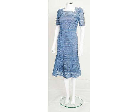 A 1940s handmade blue lace and net dress, midi length, half length sleeves, blue lace over layer with matching blue slip insi