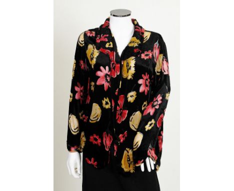 A 1990s black velvet jacket with a chiffon floral pattern in red and yellow, velvet ruched collar, one large button fastening