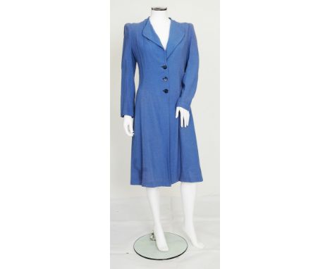 A 1940s dusky blue coloured coat, large lapels, three button fastening to front, long sleeves, 'Gallivant Coats' label to bac