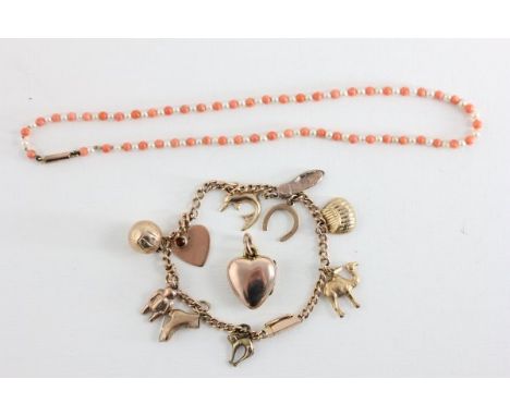15ct Gold Chain Charm Bracelet set mainly gold charms plus 9ct Gold Locket and a Seed Pearl & Coral Necklace