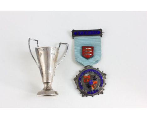 Small Silver Trophy and a Silver & Enamel Masonic Medal with Ribbon