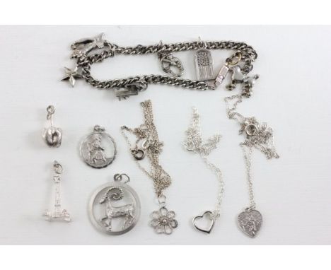 Mixed Lot of Jewellery including Charm Bracelet, Two Loose Charms, Two Silver St Christopher Pendants, Silver Pendant with St