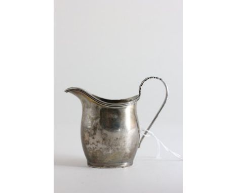 Silver Milk Jug, helmet shaped, plain body with leaf scroll handle, Chester 1903