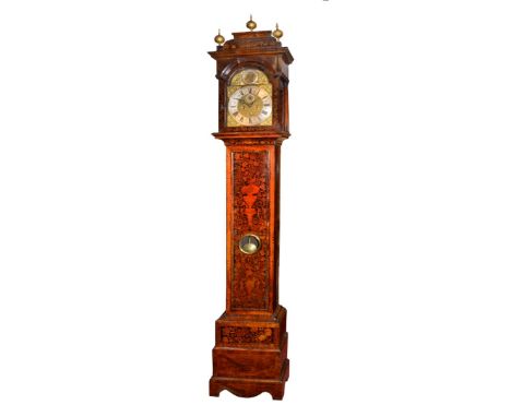 AN EARLY 18TH CENTURY WALNUT AND MARQUETRY LONGCASE CLOCK, the 11" break arch dial with silvered Roman chapter ring, Arabic f