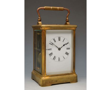 A FRENCH CARRIAGE CLOCK with white enamel Roman dial, Henri Jacot movement with replaced platform lever escapement and coiled