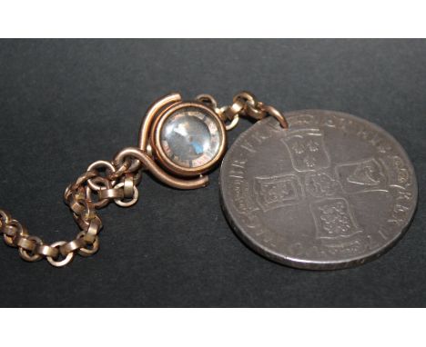 A 9CT GOLD WATCH CHAIN, 38cm long with attached gold compass and silver coin