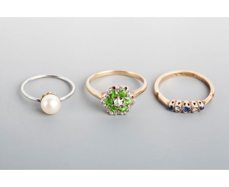 A FIVE STONE SAPPHIRE AND DIAMOND RING in 18ct gold, a single stone pearl ring and a further cluster ring (3)