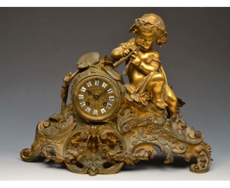 A 19TH CENTURY FRENCH MANTEL CLOCK having blue and white enamel Roman cushion shaped chapters, the drum movement with outside
