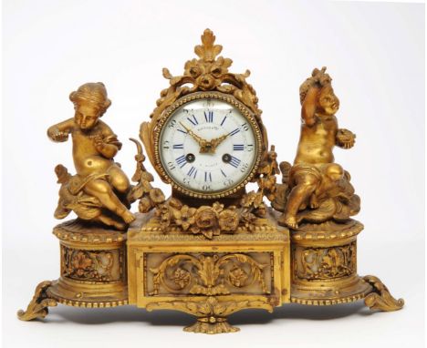 A 19TH CENTURY FRENCH MANTEL CLOCK the white enamel convex dial with blue enamel Roman chapters, Arabic five minutes, signed 