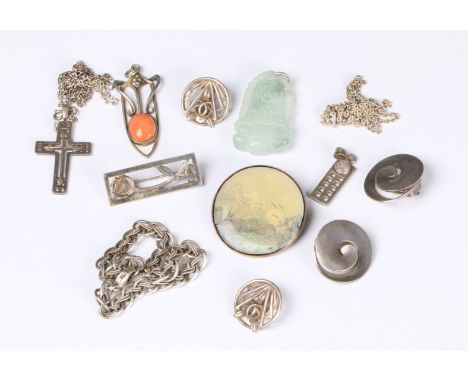 A JADE PENDANT carved in the form of a Buddha, an Art Nouveau coral set pendant, some silver jewellery after Rennie Mackintos