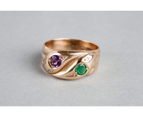 AN EMERALD AND AMETHYST RING in the form of two interlocking snakes with diamond set eyes in 9ct gold