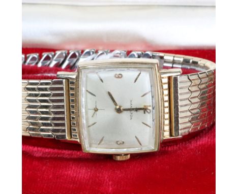 A GENTLEMANS WRIST WATCH by Hamilton, rectangular silvered dial with gilt Arabic numerals and baton and subsidiary dial, case
