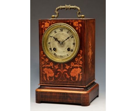 A 19TH CENTURY CAMPAIGN CLOCK with engine turned silvered Roman dial and cast brass bezel, the twin train movement with bell 