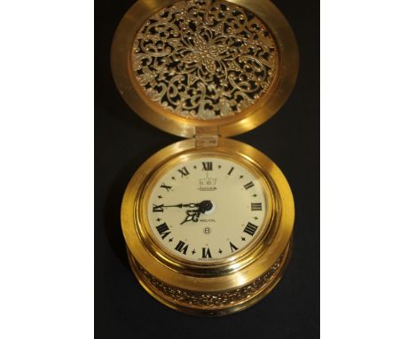 A JAEGER RECITAL 8 DESKTOP OR BOUDOIR ALARM CLOCK, the cream Roman dial with 24 hour alarm aperture within a cast open scroll