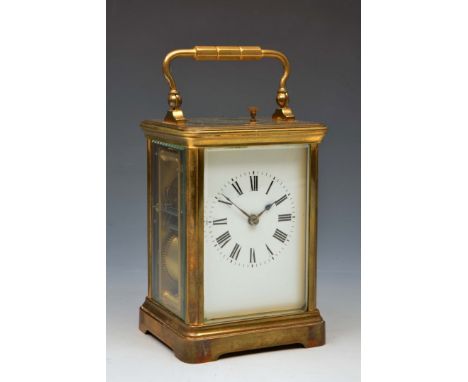 A FRENCH CARRIAGE CLOCK with white enamel Roman dial, platform lever escapement, push button repeat striking on a coiled gong
