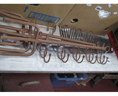 A Metal Coat Rack, in the form or a comb, three others. (4)