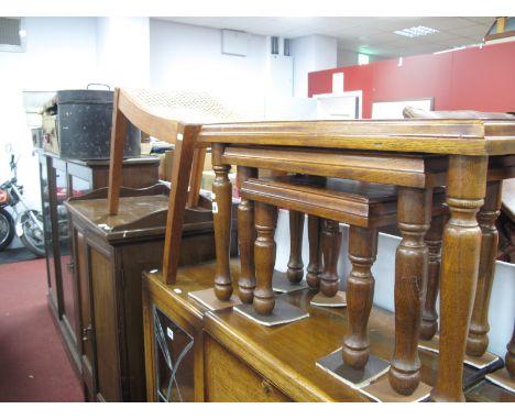Oak Nest of Tables, together with a stool, with a carved top. (2)