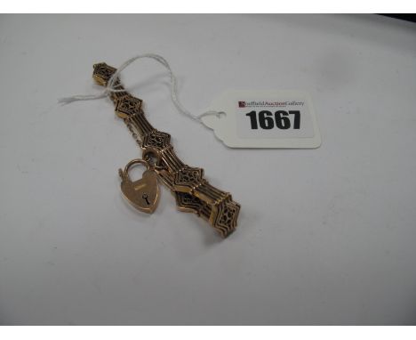 A Gate Style Bracelet, of openwork design, with alternate filigree details, to heart shape padlock clasp, stamped "9c CDB".