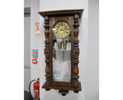 A XIX Century Vienna Wall Clock, with a stepped pediment, circular dial, Roman Numerals, subsidiary minute dial.