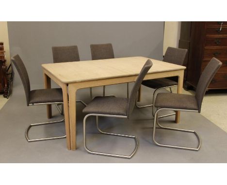 A SKOVBY DANISH DESIGN DINING SUITE, modern, in white oiled oak, comprising an SM23 extending dining table with rounded oblon