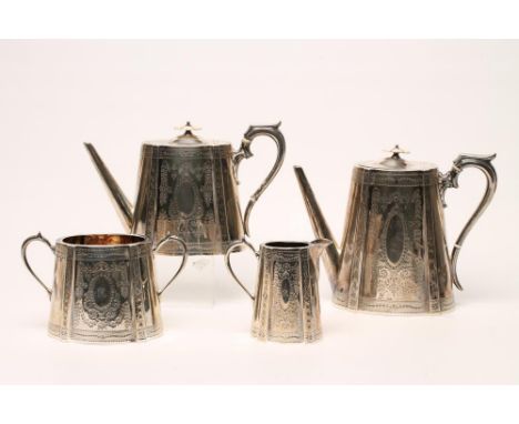 A COMPOSITE VICTORIAN SILVER FOUR PIECE TEA AND COFFEE SERVICE, maker H.H. &amp;  J.E. Bingham, Sheffield 1871/2/3, of fluted