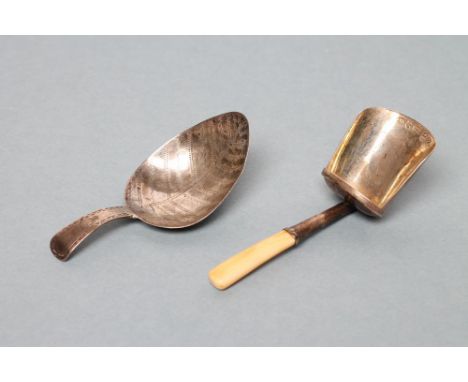 A LATE GEORGE III SILVER CADDY SPOON, maker's mark possibly IT, London 1801, the leaf shaped bowl wrigglework engraved with v