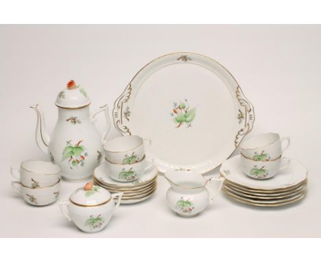 A HEREND PORCELAIN TEA SERVICE, modern, printed and overpainted in polychrome enamels with the "Rose Hip" pattern within bask