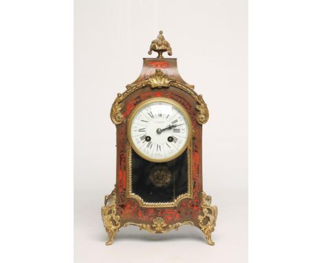 A FRENCH "BOULLE" CASED MANTEL CLOCK by Marli, the twin barrel movement striking on a gong and with sunburst pendulum, 4" whi