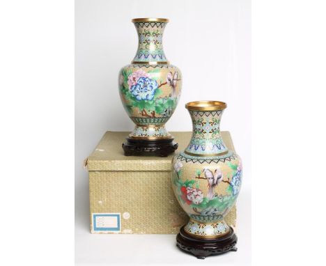 A PAIR OF CHINESE CLOISONNE ENAMEL VASES, 2nd half 20th century, of baluster form, enamelled in bright colours with finches p