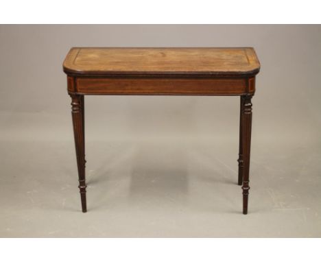 A MAHOGANY FOLDING CARD TABLE in the manner of Gillow, early 19th century, of rounded oblong form, crossbanded with stringing