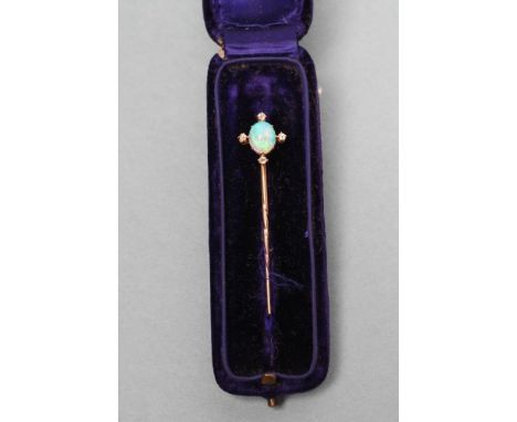 A VICTORIAN STICK PIN, the oval cabochon polished opal set with four small diamond points, unmarked, cased (Est. plus 21% pre