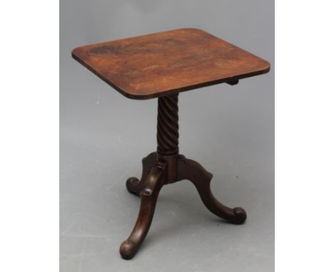 A GEORGIAN MAHOGANY TRIPOD TABLE, 18th century, possibly Irish, the rounded square tip up top on wrythen turned stem, shaped 