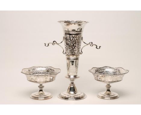 A PAIR OF SILVER PEDESTAL TAZZE, maker Ackroyd Rhodes, London 1914, of shaped circular form with bobbin cast rim over ovolo a