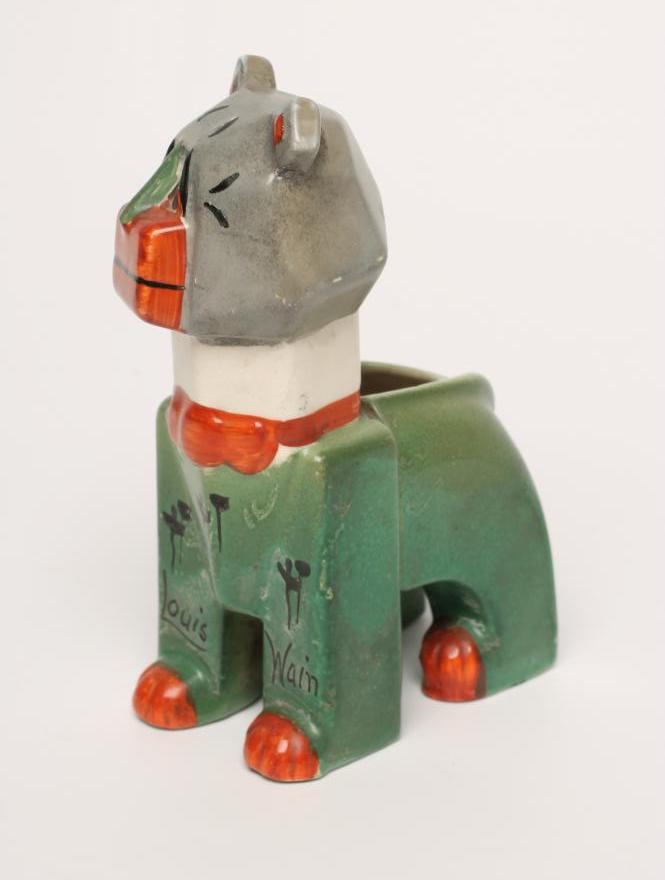A LOUIS WAIN FUTURISTIC CAT POTTERY SPILL HOLDER, 1920's