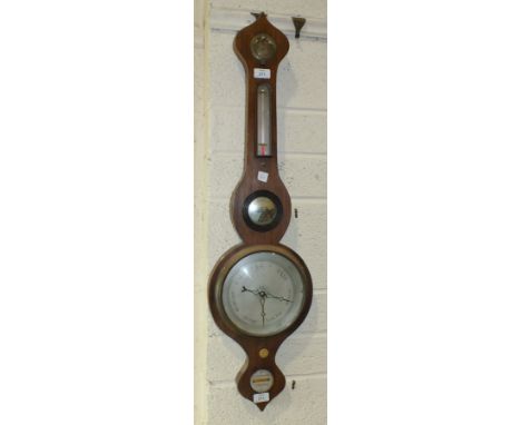 A mahogany wheel barometer, the level dial signed 'J Reynolds, St Austell', 96cm.